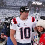 Anne Michael, wife of Drake May, dresses up in leopard print to explore Kyoto with the Patriots QB