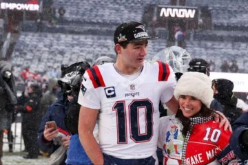 Anne Michael, wife of Drake May, dresses up in leopard print to explore Kyoto with the Patriots QB