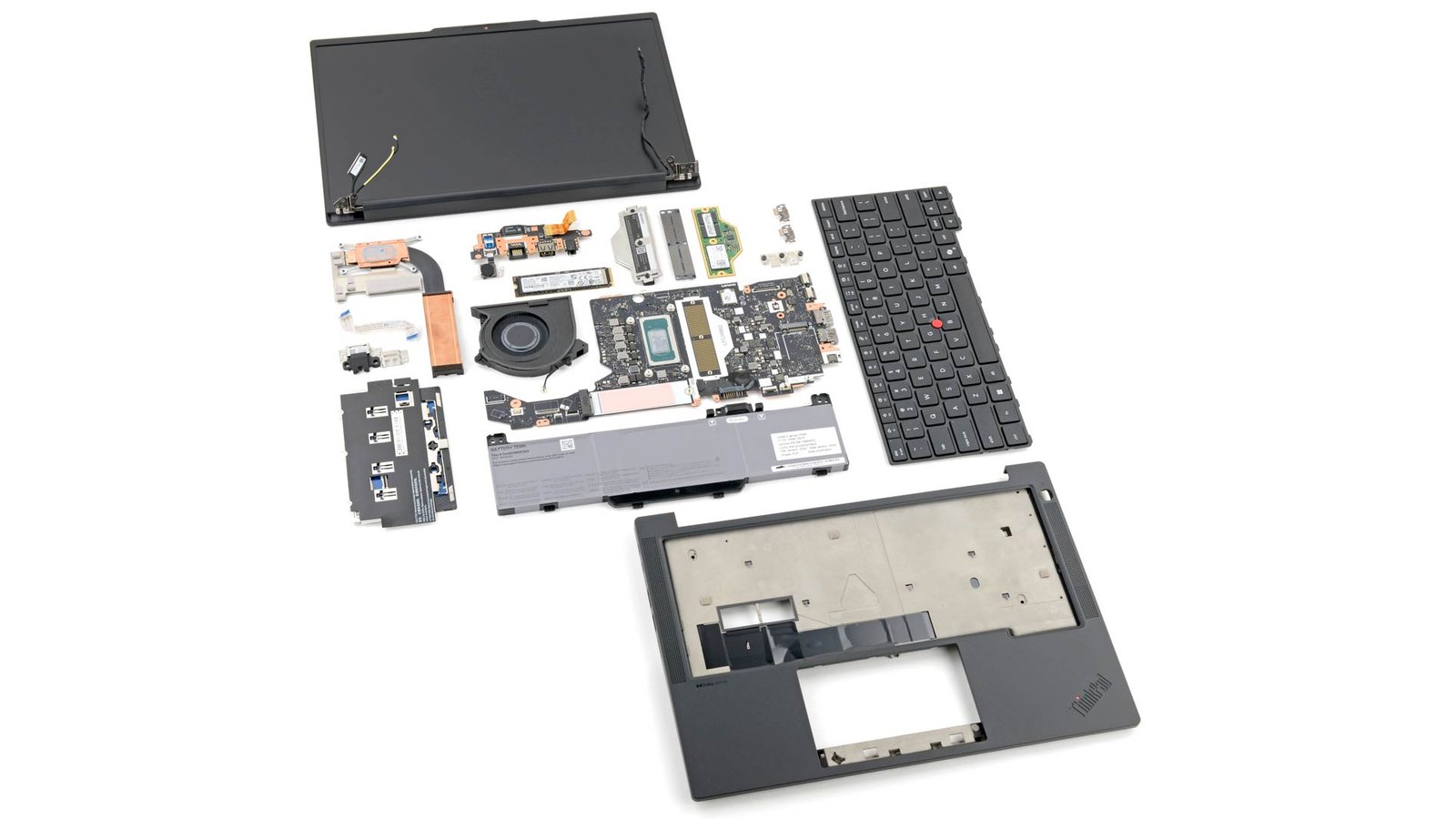 A fully disassembled ThinkPad T14 Gen 7 laptop, with the components neatly laid out
