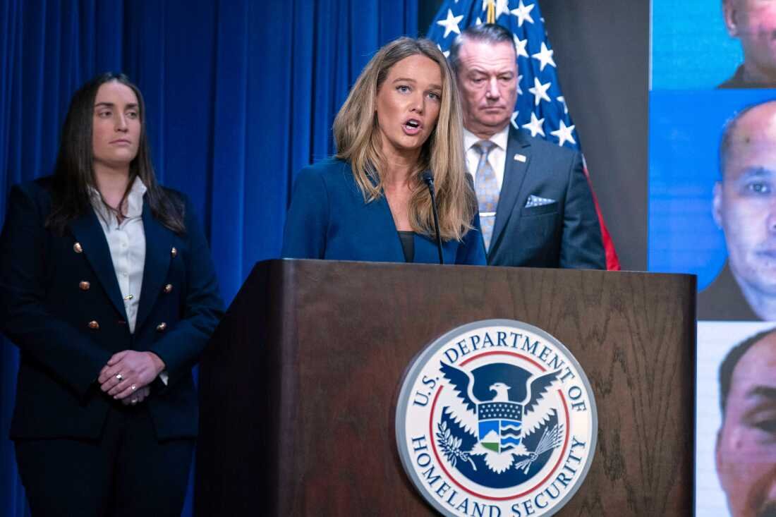Then-DHS Assistant Secretary for Public Affairs Tricia McLaughlin, flanked by deputy director of U.S. Immigration and Customs Enforcement Madison Sheahan, left, and Acting director of U.S. Immigration and Customs Enforcement Todd Lyons, speaks during a news conference at ICE Headquarters, in Washington, D.C., on May 21, 2025.